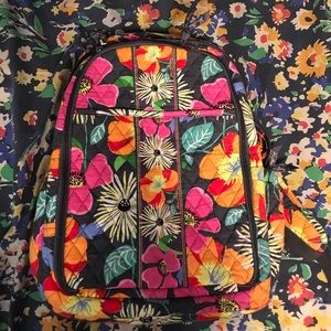 Vera Bradley orange and pink floral backpack.